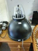 A pair of industrial style hanging lamps