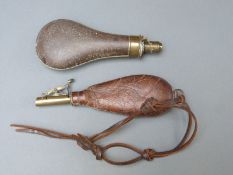 Two powder/shot flasks, one G & JW Hawksley with metal body and brass top, overall length 21cm,