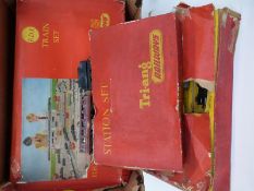 Two Tri-ang 00 gauge train sets RO Passenger Train and RX Train Set together with a Station Set R81,