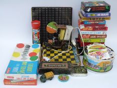 A large quantity of children's games to include Tiddly Winks and Cup Winner,