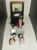 Two German porcelain busts, framed pictures,