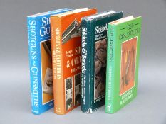 Four gun related books comprising Shotguns and Cartridges For Game and Clays by Gough Thomas,