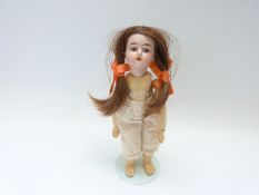 Ernst Heubach bisque headed doll with open mouth, fixed blue eyes,