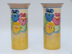 A pair of Clarice Cliff Bizarre Newport Pottery vases in the Delicia Pansy pattern,