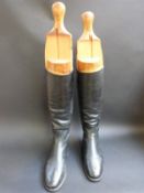 Two pairs of leather boots and trees with ivorine plaques Peal and Co, London,