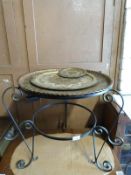 A tray topped metal table (diameter 55cm) and two metal trays