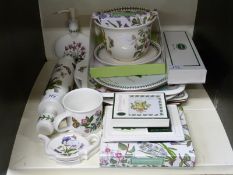 A collection of Portmeirion Botanic Garden to include rolling pin, tray, table mats, jardiniere,