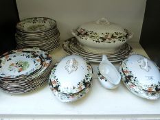 An early 20thC Myott dinner service with chinoiserie decoration,