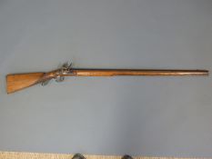 East India Co Flintlock hammer action plains musket with chequered grip,