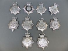 Ten police helmet badges including an enamel Nottinghamshire Constabulary example, North Yorkshire,