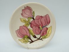 Moorcroft charger in Magnolia pattern,
