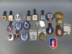 A collection of mainly Belgian police badges and insignia including municipal forces