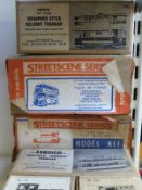 Approximately 10 white metal kit built model buses,