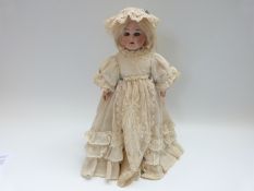 Armand Marseille bisque headed doll with open mouth, weighted blue eyes,