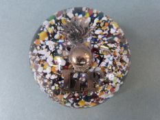 A Lancashire Fusiliers glass paperweight