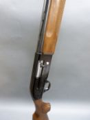 Beretta A 301 12 bore semi-automatic shotgun with ornate engraving, semi-pistol grip,