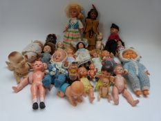 Twenty-six various miniature dolls including Rosebud, Patsy,
