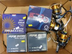 Six fixed spool fishing reels including Fladen,