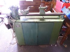 A Myford ML 8 wood turning lathe together with face plates and tools