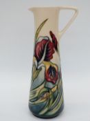 Moorcroft Collector's Club ewer decorated with irises,