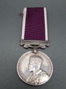 A George V regular army long service and good conduct medal awarded to 1020072 S. Sjt. T.W.
