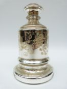 A Victorian mercury glass candle stick,