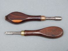 A rosewood handled nipple wrench with in built nipple pricker together with a mahogany handled flat