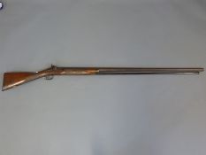 Hollis and Sheath of London 8 bore single barrelled percussion hammer action gun with scenes of