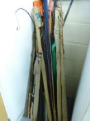 A quantity of fishing rods including carbon Hiline quiver, vintage fibreglass and cane,