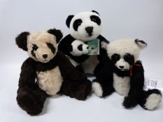 Three panda teddy bears including a limited edition WWF millenium bear group 1594/2000,