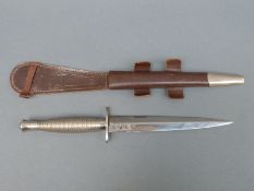 Wilkinson Sword Fairbairn-Sykes fighting knife with 17cm double edged blade etched 'Wilkinson Sword