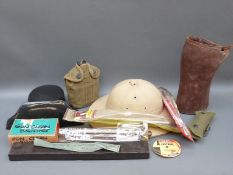 A quantity of gun cleaning kits, hats etc.