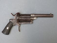 A 7mm six shot pinfire hammer action pepperbox revolver with 3.