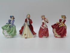 Royal Doulton figures Top o' The Hill in two colourways,