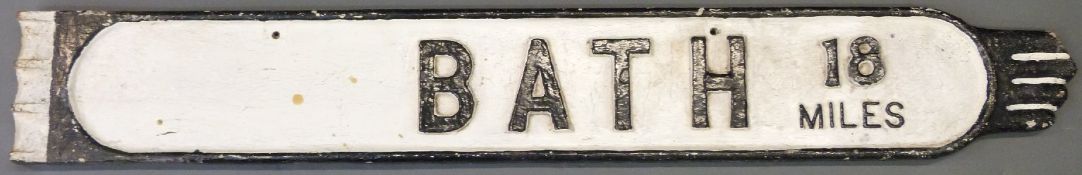 A vintage cast iron 'Bath 18 miles' double sided finger post road sign,