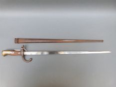 An 1874 French bayonet, serial no 20038, inscribed St Etienne 1880,
