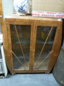 A glazed walnut Art Deco style cabinet (H115 x W95 x D37cm)