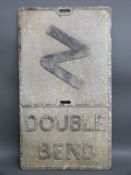A large vintage cast aluminium 'double bend' road sign, 75.