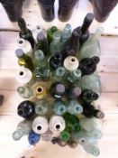 A collection of bottles to include marble bottles, Hamilton, Stroud Brewery, Godsall Cirencester,