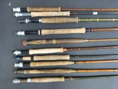 A collection of vintage coarse and fly rods including Daiwa, Hardy 9' fibreglass,