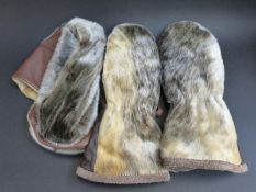 A pair of sealskin wool lined mittens and a matching hat, new with tags.