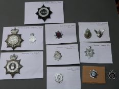 A collection of police badges relating to various airports including Manchester, Liverpool,