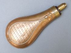 G & J.W Hawksley copper and brass powder flask with embossed floral decoration, 19.5cm long.