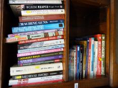 Approximately 50 military interest reference books relating to guns, bladed weapons,