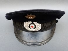 A Reichskriegerbund German visor cap marked Ulrich Haslach to inner rim