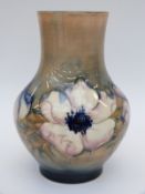 William Moorcroft vase in early Clematis pattern on an ochre ground, c.