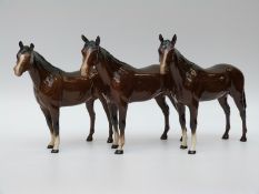 Three Beswick horses