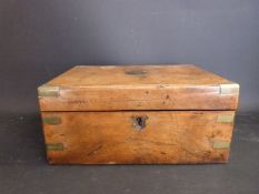 A 19thC brass bound writing slope with cartouche inlaid to lid