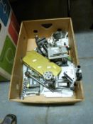 A quantity of tools including drills, vices,