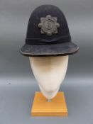 A vintage Irish police helmet